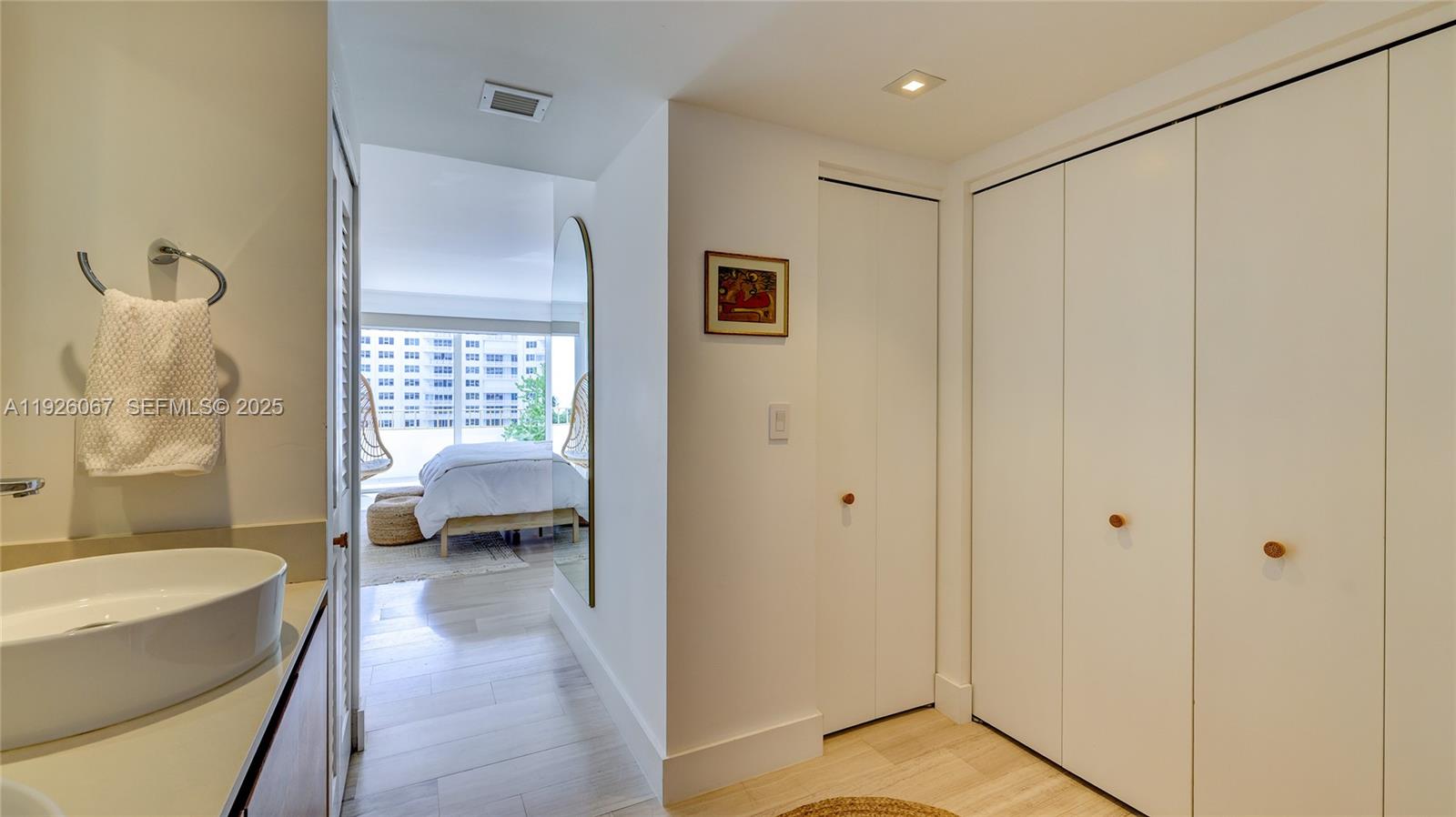 177 Ocean Ln Drive, Unit 707 Key Biscayne, FL 33149 - Photo 24 of 29 a en suite spacious bathroom with a tub shower and a sink