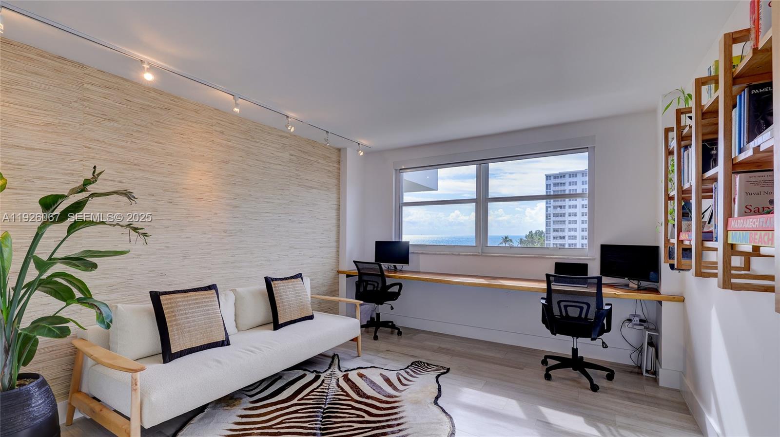 177 Ocean Ln Drive, Unit 707 Key Biscayne, FL 33149 - Photo 25 of 29 a view of a workspace with furniture and a window