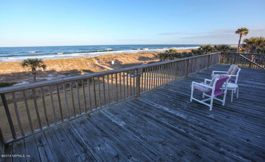 318 Ocean Front Neptune Beach, FL 32266 - Photo 13 of 26 a balcony with wooden floor outdoor seating and city view