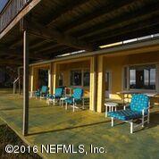 318 Ocean Front Neptune Beach, FL 32266 - Photo 22 of 26 a view of a dinning table and chair in the patio