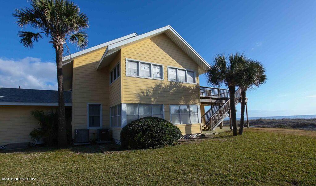 318 Ocean Front Neptune Beach, FL 32266 - Photo 6 of 26 a front view of a house with garden