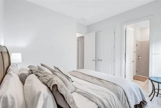 a bathroom with a sink toilet tub and shower