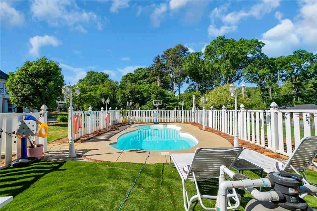 1107 Springdale Road Anderson, SC 29621 - Photo 41 of 49 This private outdoor oasis features a refreshing pool, perfect for relaxation and recreation.