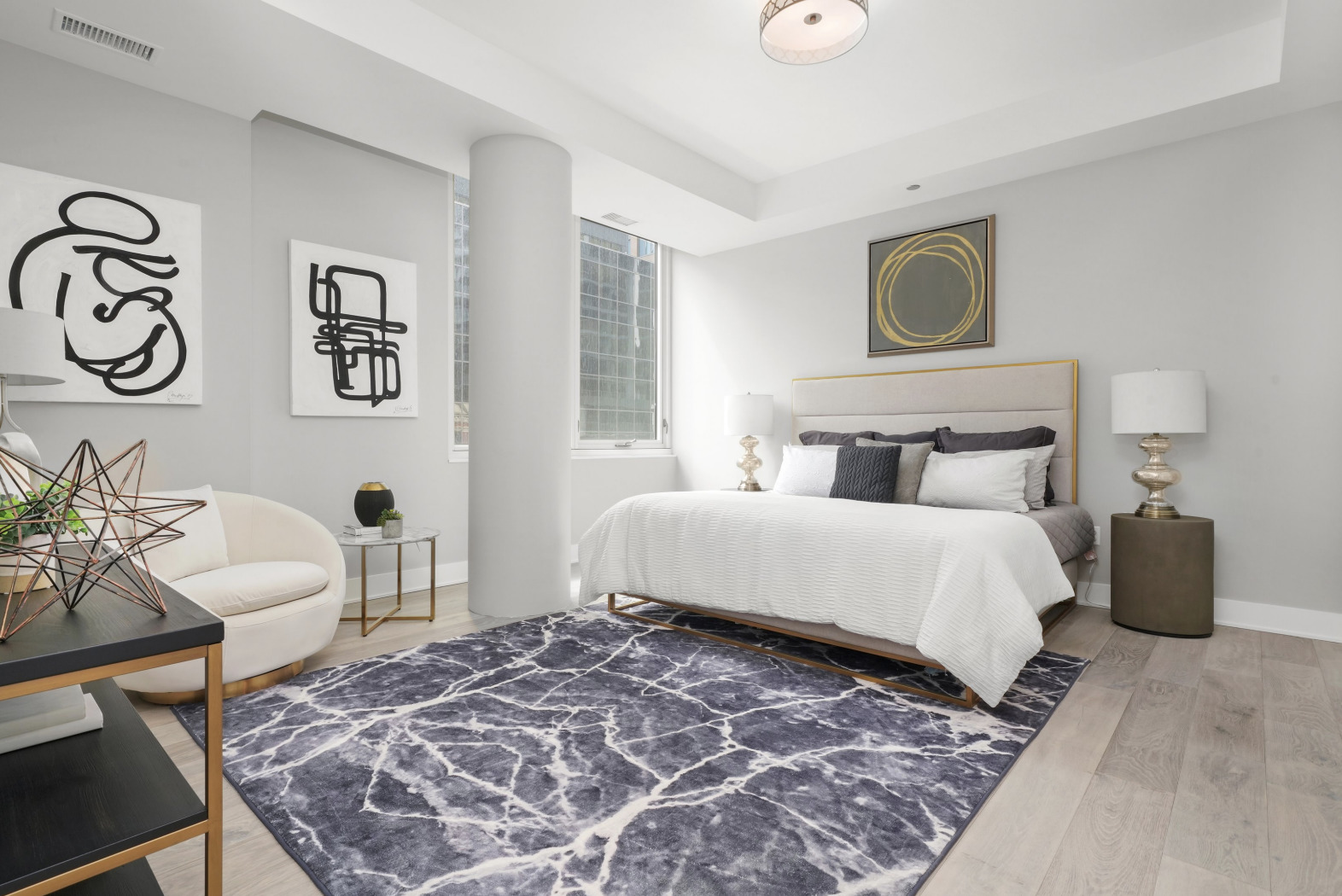 144 West Erie Street, Unit 401 Chicago, IL 60654 - Photo 11 of 25 a bedroom with a bed and furniture