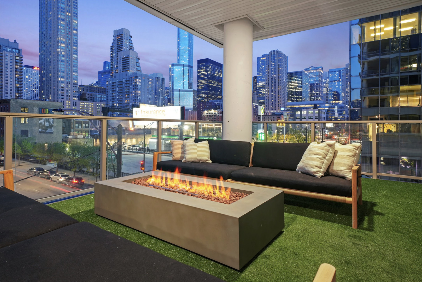 144 West Erie Street, Unit 401 Chicago, IL 60654 - Photo 16 of 25 a outdoor living space with furniture and a fireplace