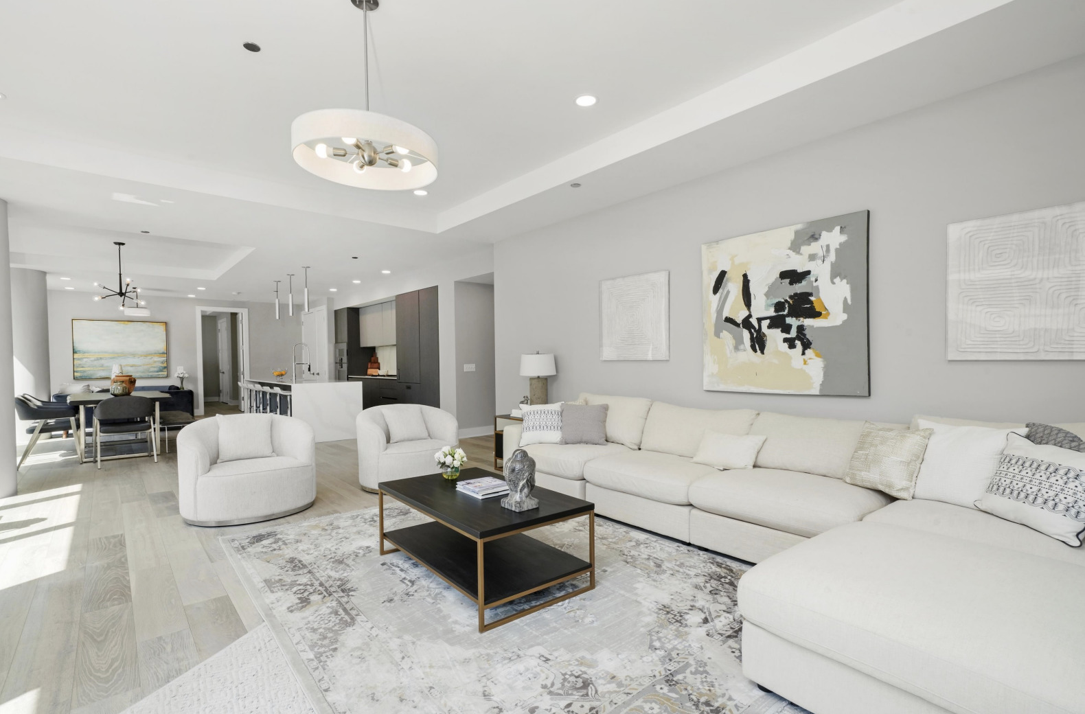 144 West Erie Street, Unit 401 Chicago, IL 60654 - Photo 3 of 25 a living room with furniture chandelier and a table
