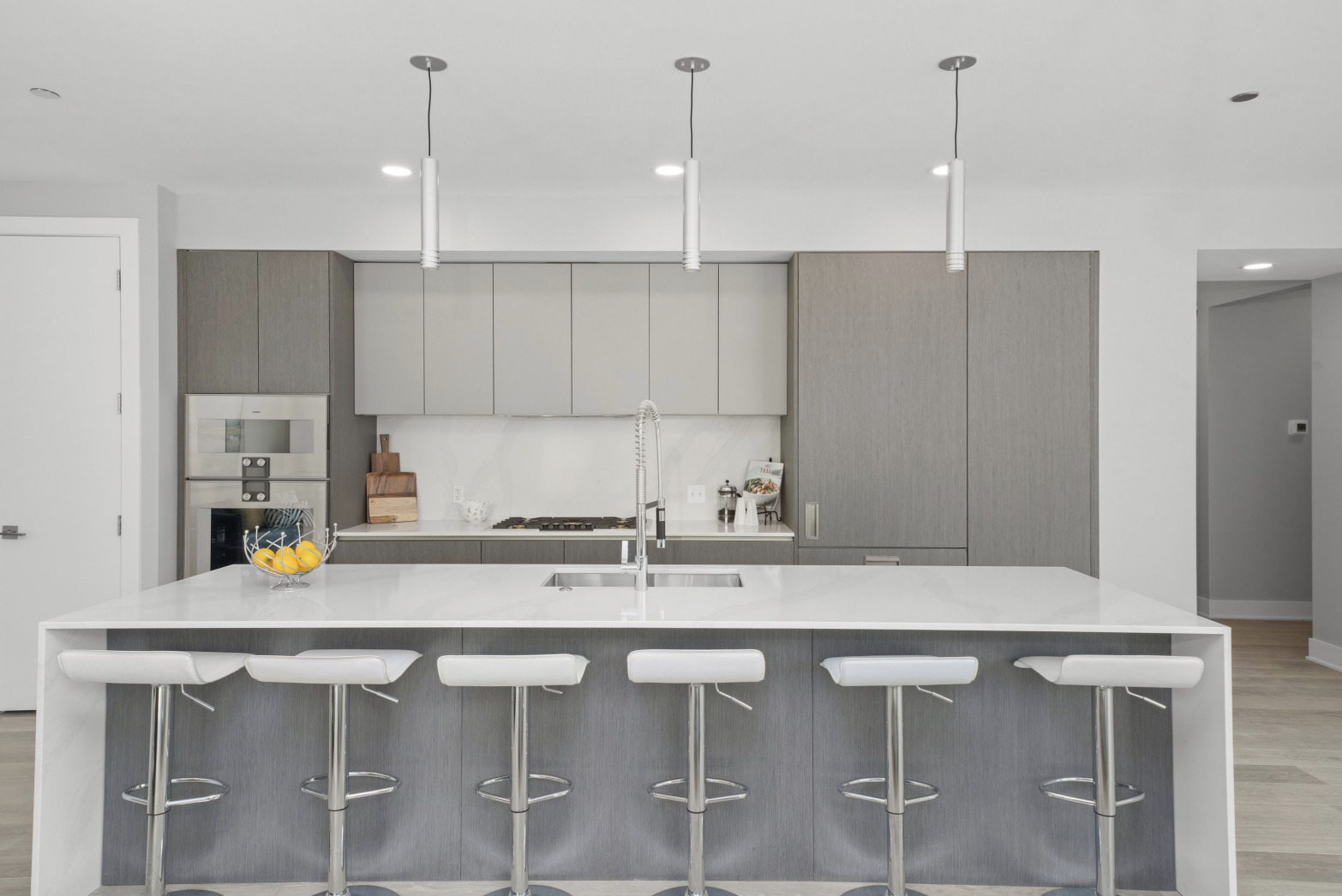 144 West Erie Street, Unit 401 Chicago, IL 60654 - Photo 8 of 25 a kitchen with a sink cabinets and window