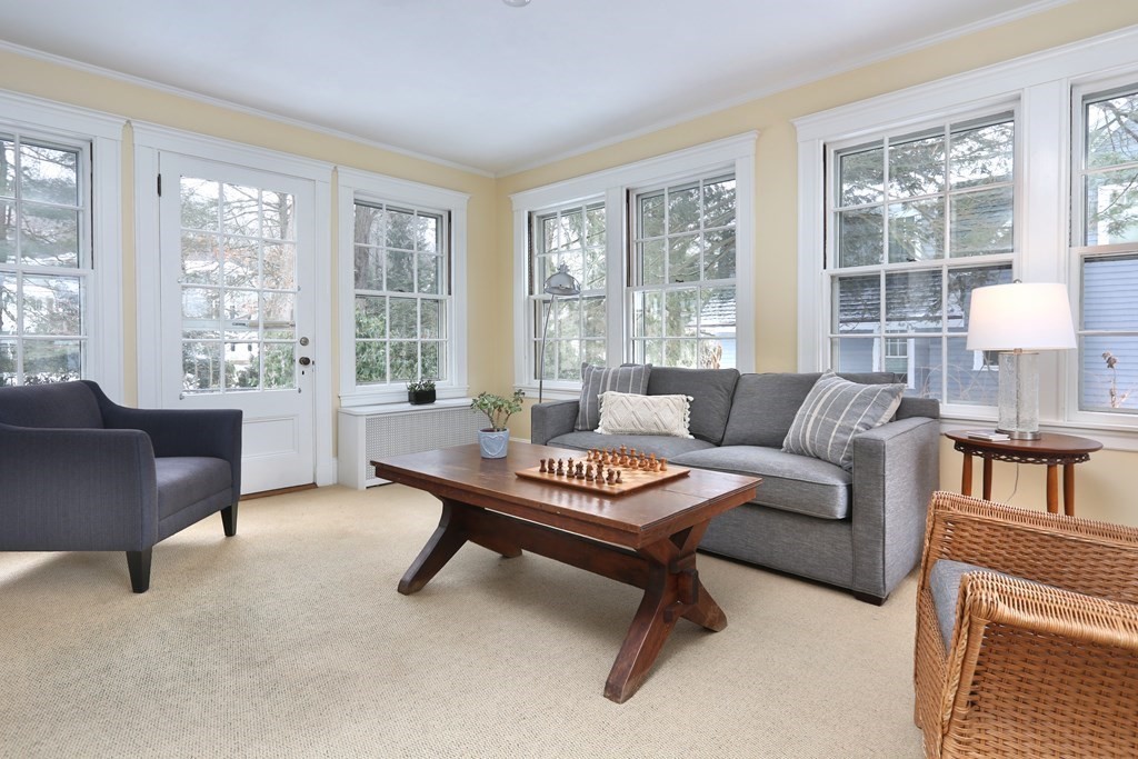 34 Livermore Road Wellesley, MA 02481 - Photo 21 of 36 a living room with furniture and a large window