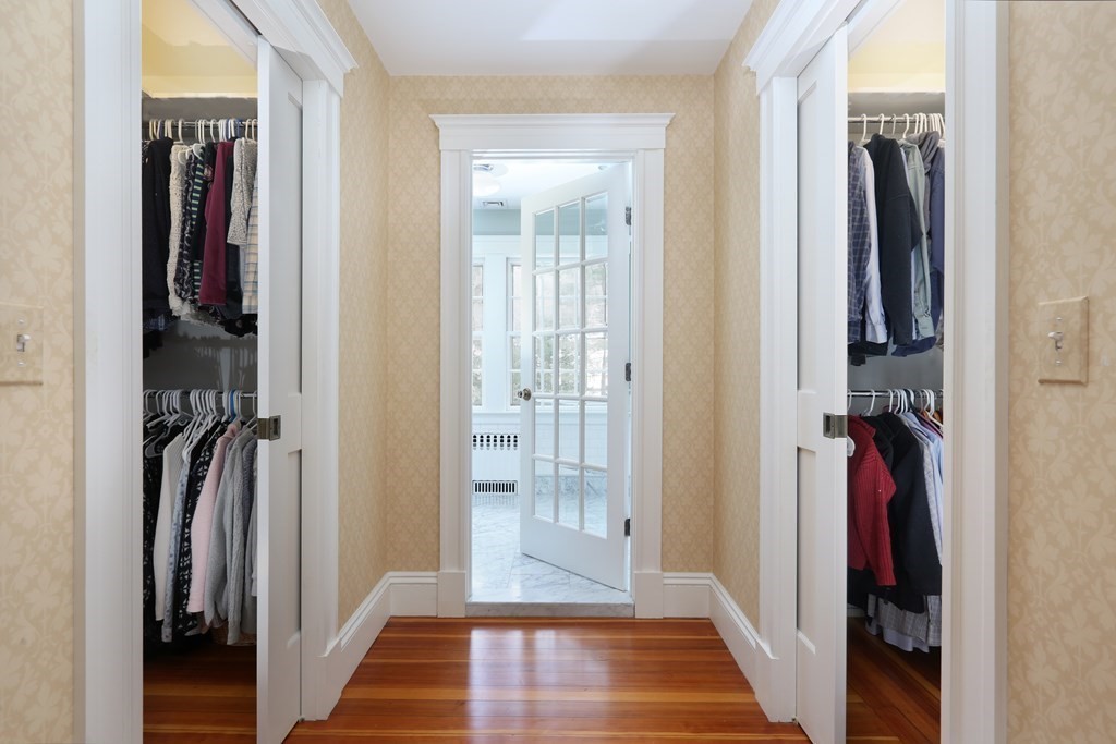 34 Livermore Road Wellesley, MA 02481 - Photo 25 of 36 a view of a hallway with closet and wooden floor