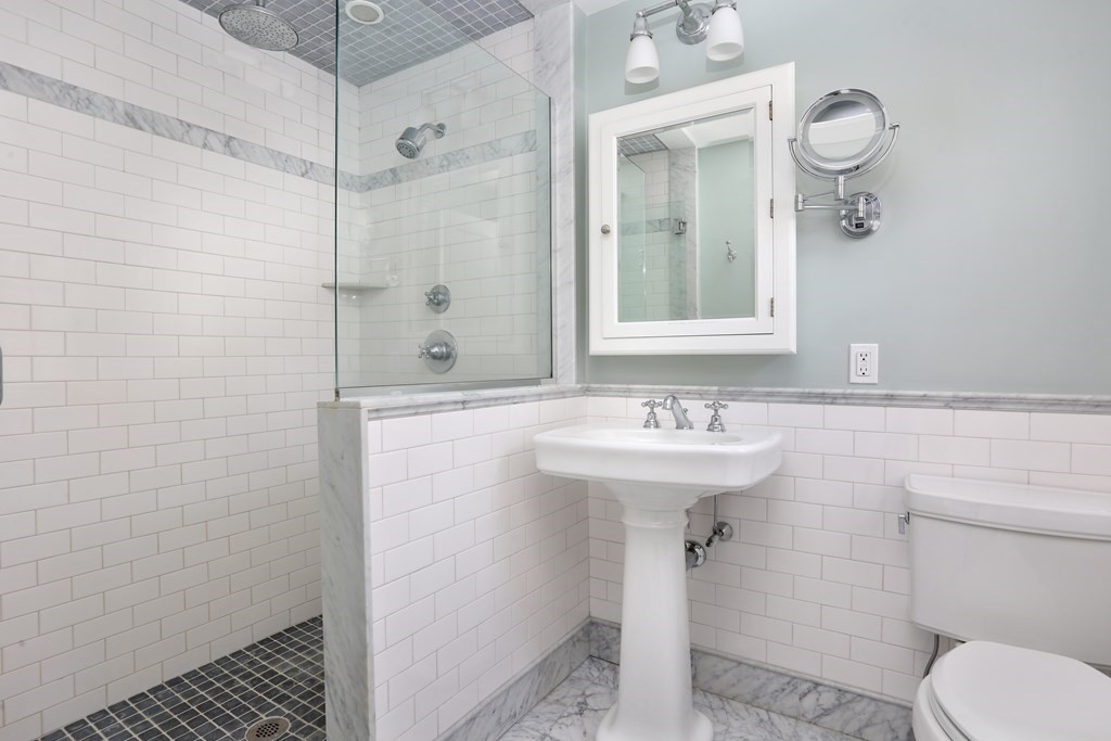 34 Livermore Road Wellesley, MA 02481 - Photo 26 of 36 a bathroom with a sink a toilet and shower