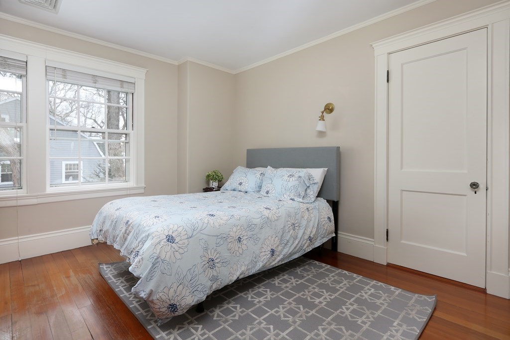 34 Livermore Road Wellesley, MA 02481 - Photo 30 of 36 a bedroom with a bed and a window