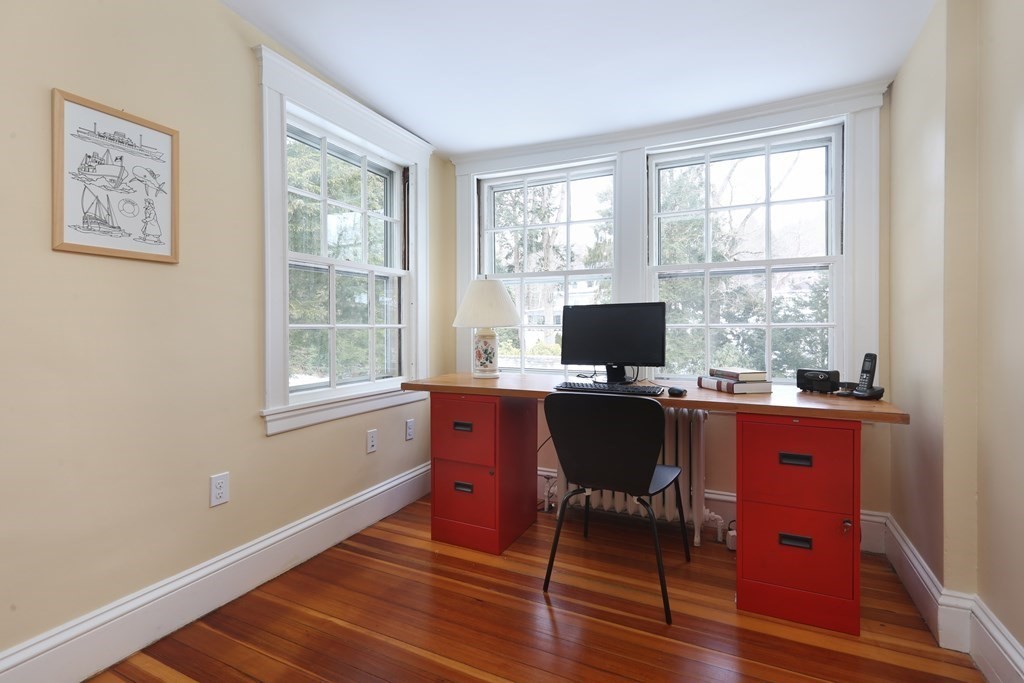 34 Livermore Road Wellesley, MA 02481 - Photo 33 of 36 a view of a workspace with wooden floor and a window