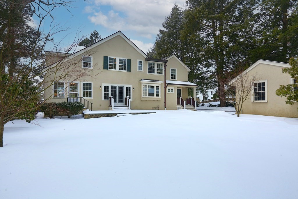 34 Livermore Road Wellesley, MA 02481 - Photo 36 of 36 a front view of a house with a yard