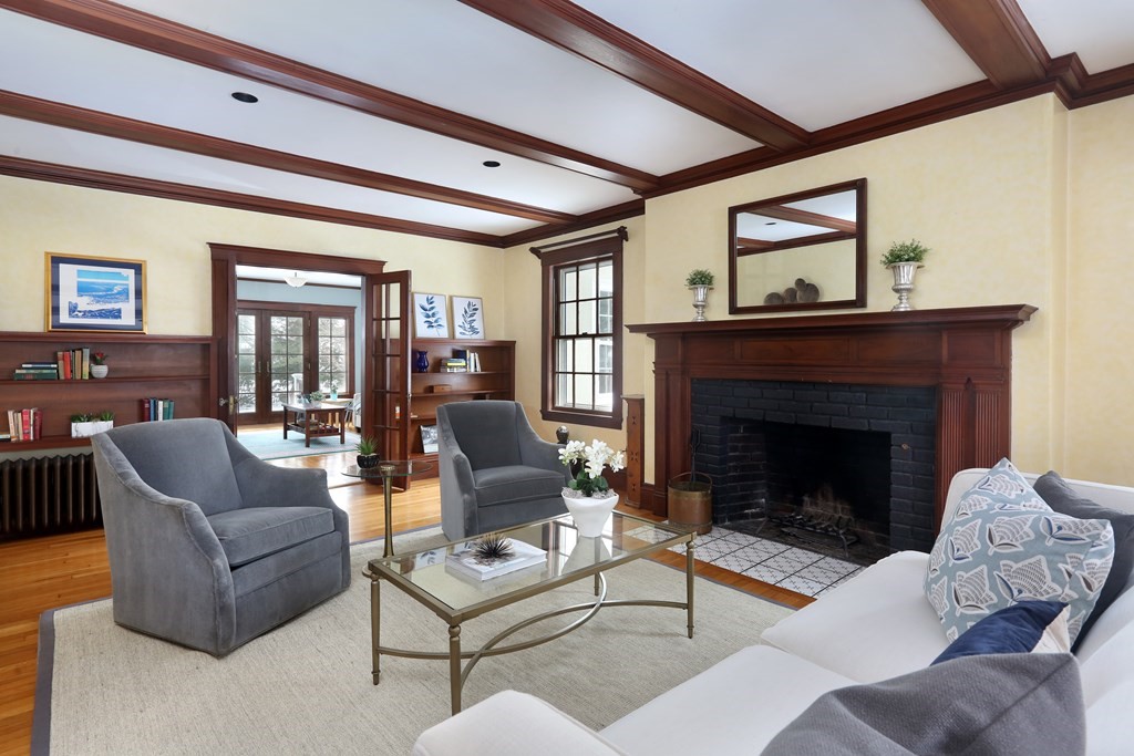 34 Livermore Road Wellesley, MA 02481 - Photo 5 of 36 a living room with furniture and a fireplace