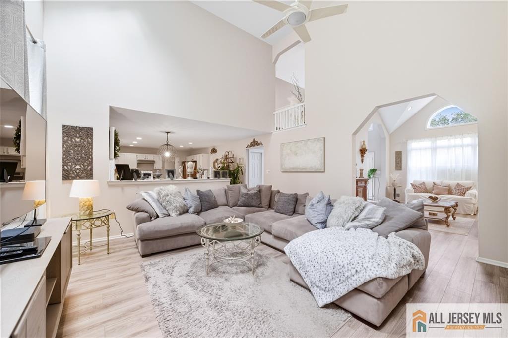 2 Guinevere Road Monroe Township, NJ 08831 - Photo 8 of 40 a living room with furniture and a large window