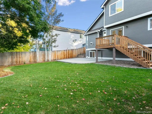 a view of a house with a back yard