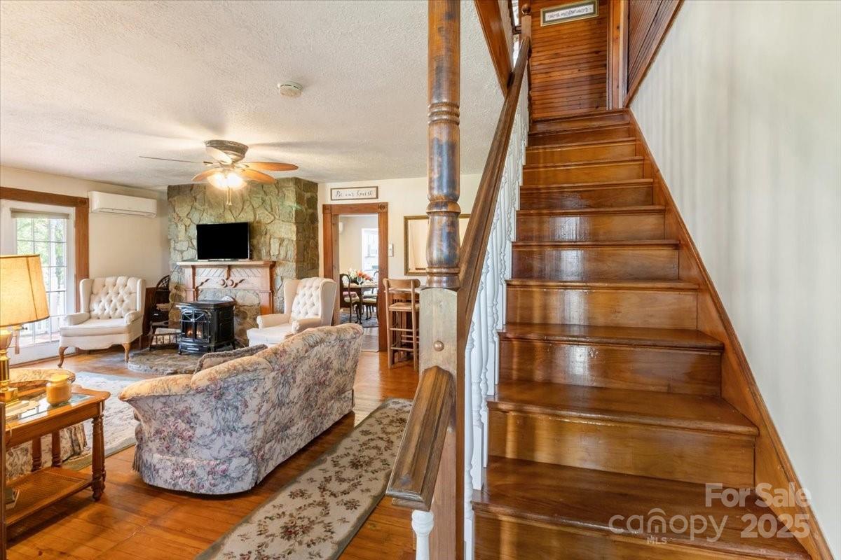 201 Murphy Hill Road Weaverville, NC 28787 - Photo 13 of 48 a living room with furniture and a flat screen tv