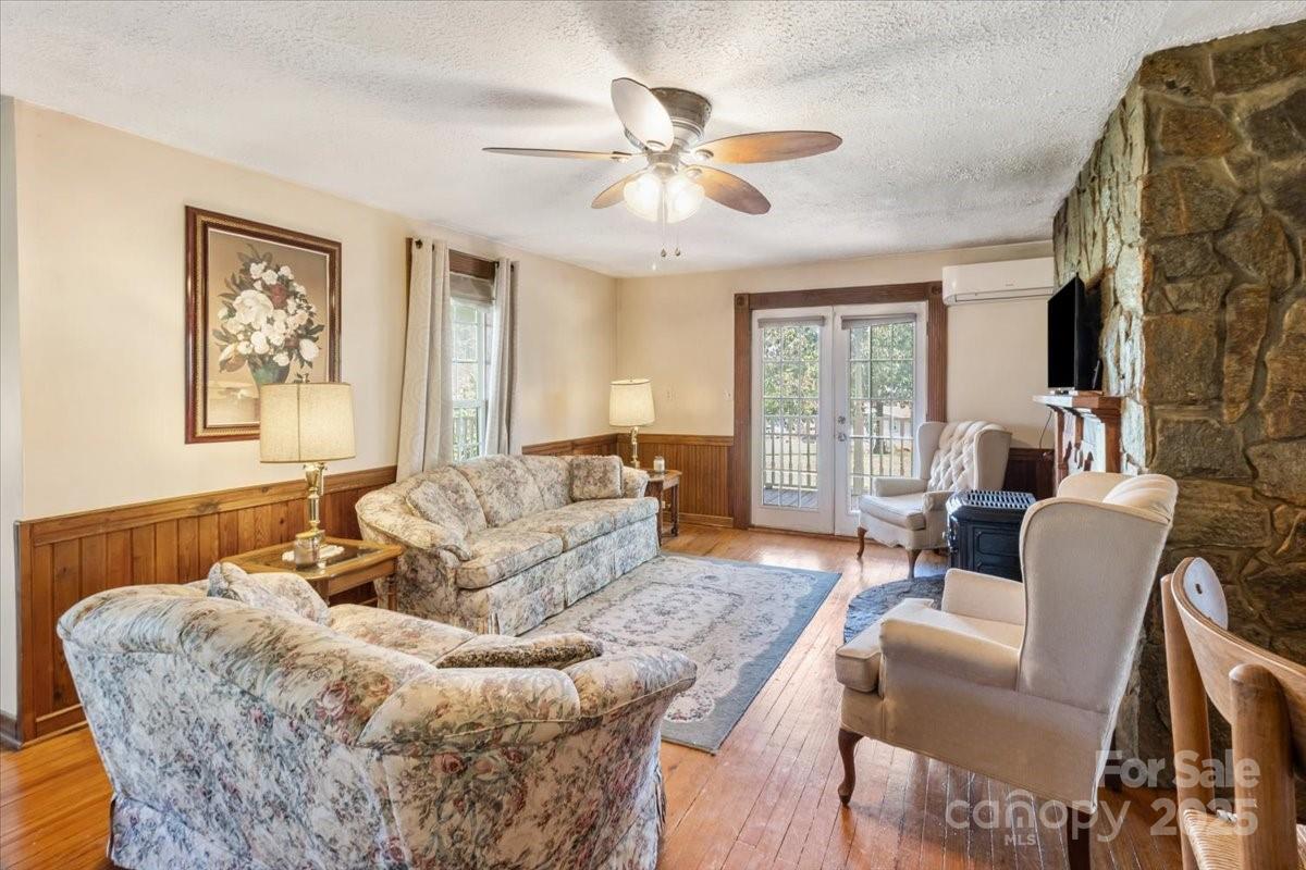 201 Murphy Hill Road Weaverville, NC 28787 - Photo 16 of 48 a living room with furniture and a large window
