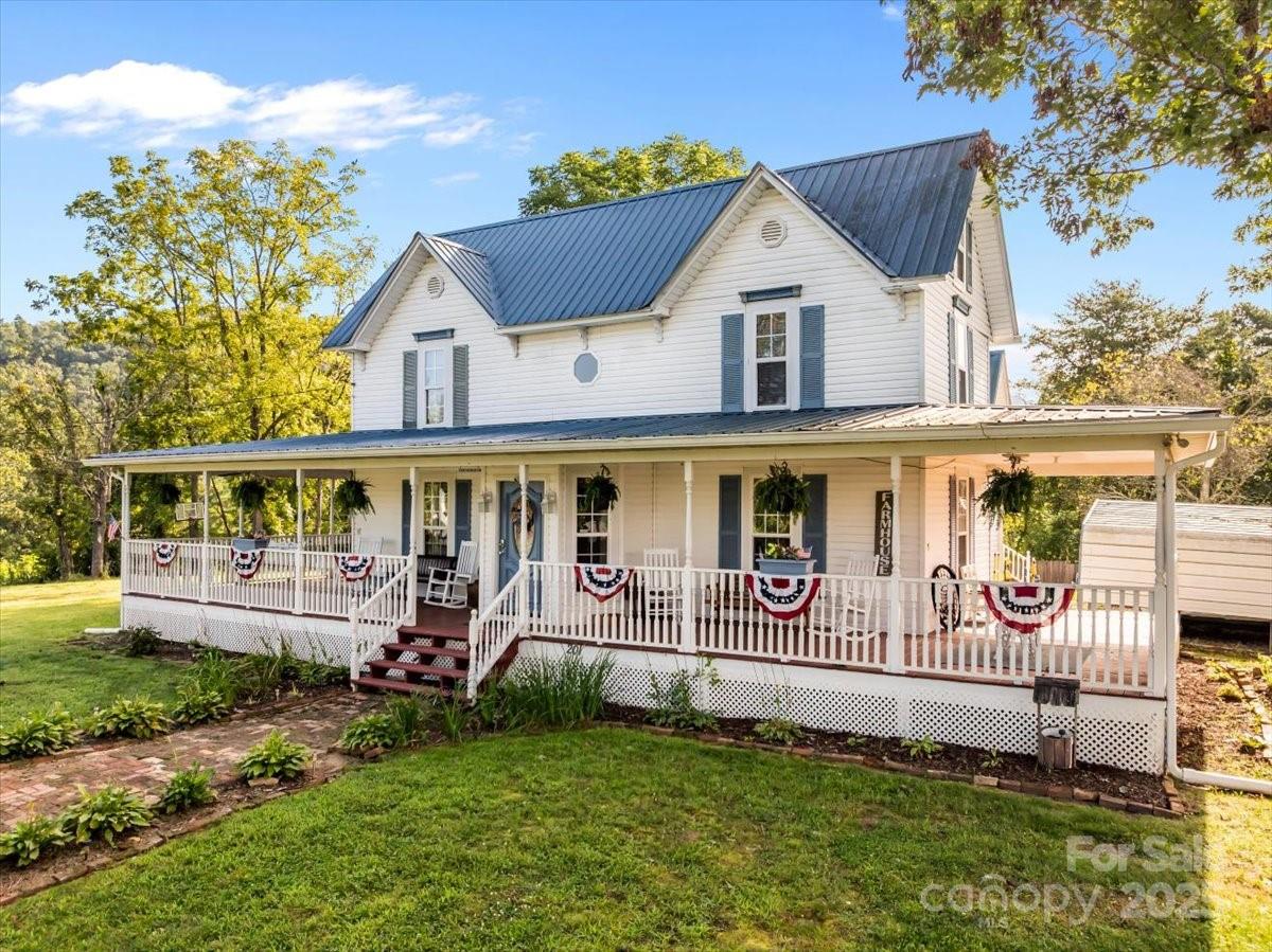 201 Murphy Hill Road Weaverville, NC 28787 - Photo 2 of 48 a front view of a house with a yard
