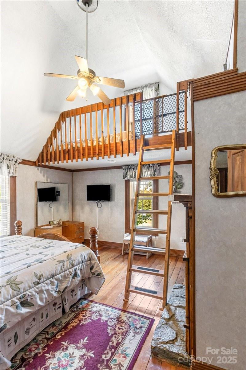 201 Murphy Hill Road Weaverville, NC 28787 - Photo 29 of 48 a bedroom with bed and a window