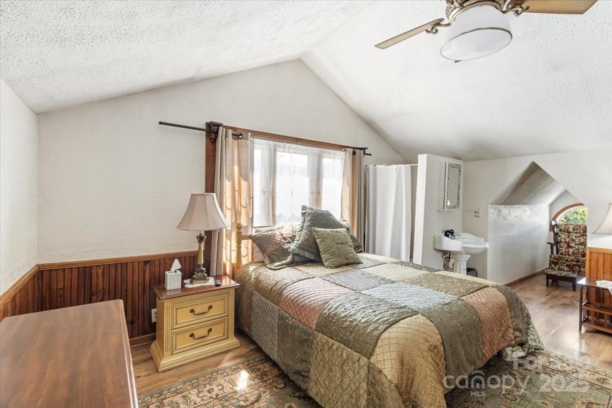 201 Murphy Hill Road Weaverville, NC 28787 - Photo 31 of 48 a bed room with a bed and a dresser