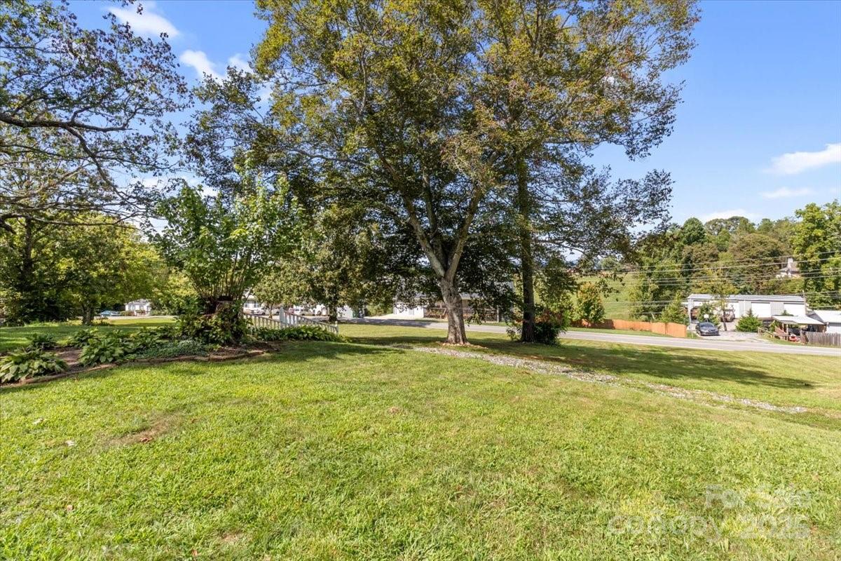 201 Murphy Hill Road Weaverville, NC 28787 - Photo 38 of 48 a swimming pool with trees in the background