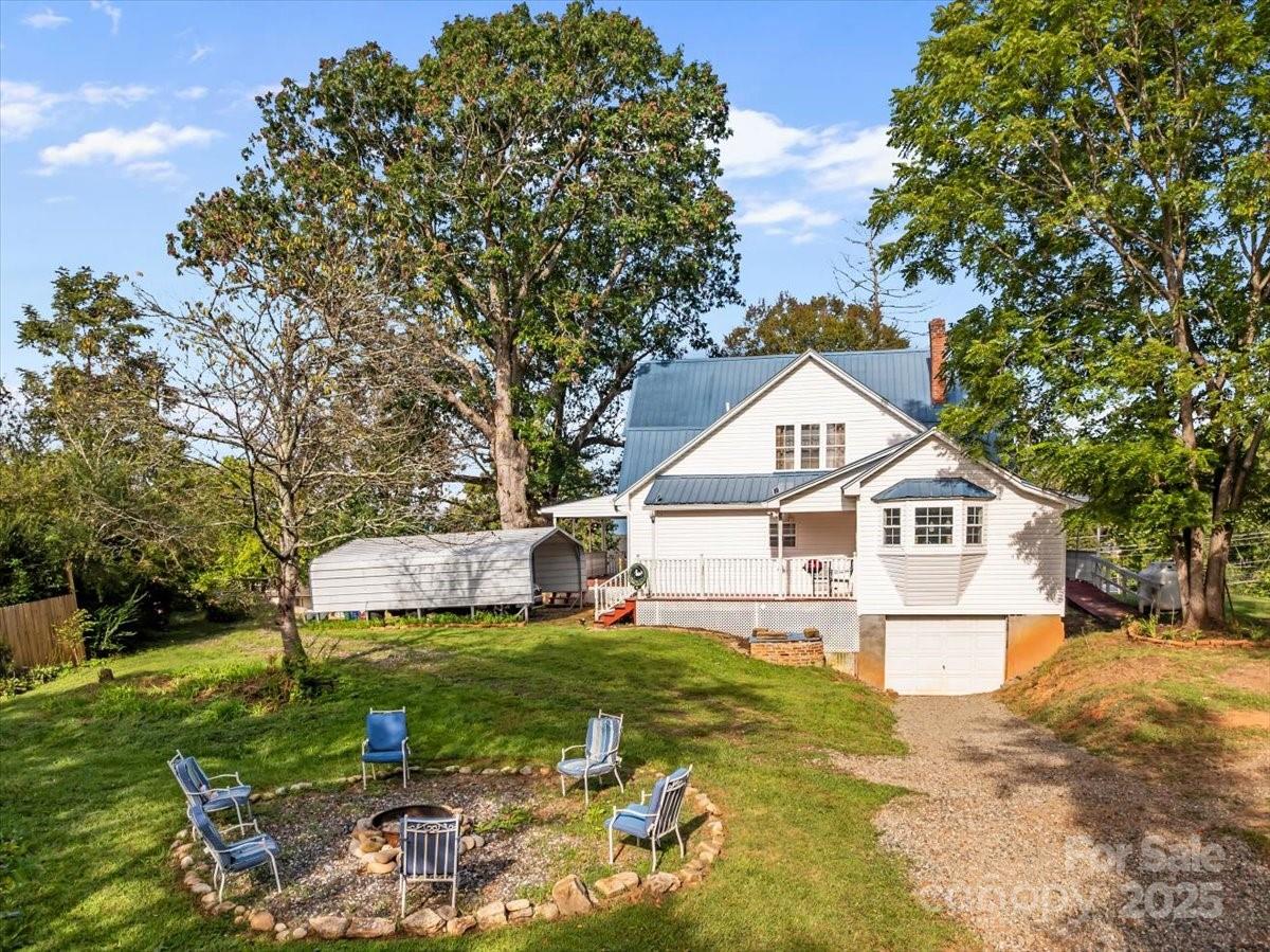 201 Murphy Hill Road Weaverville, NC 28787 - Photo 41 of 48 a view of a house with a yard