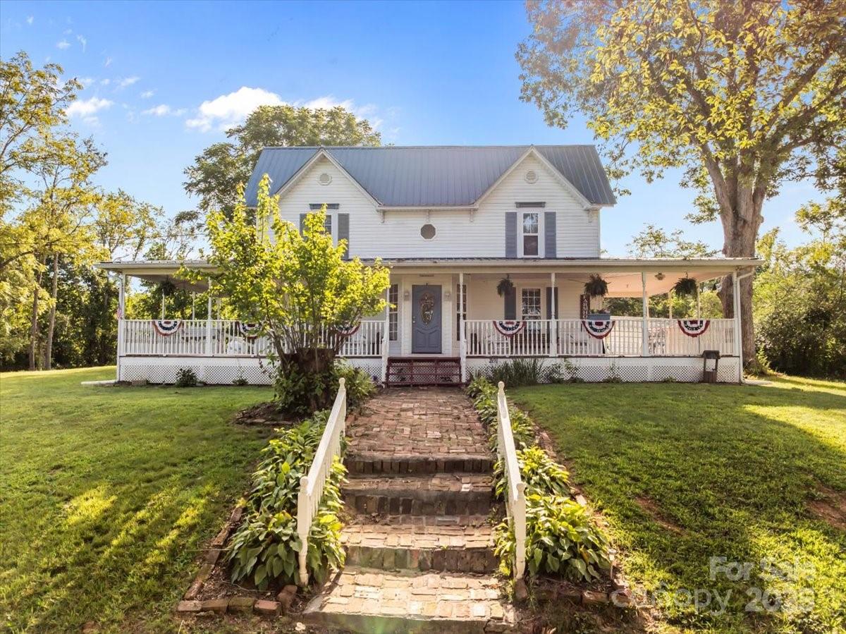 201 Murphy Hill Road Weaverville, NC 28787 - Photo 45 of 48 a front view of a house with garden