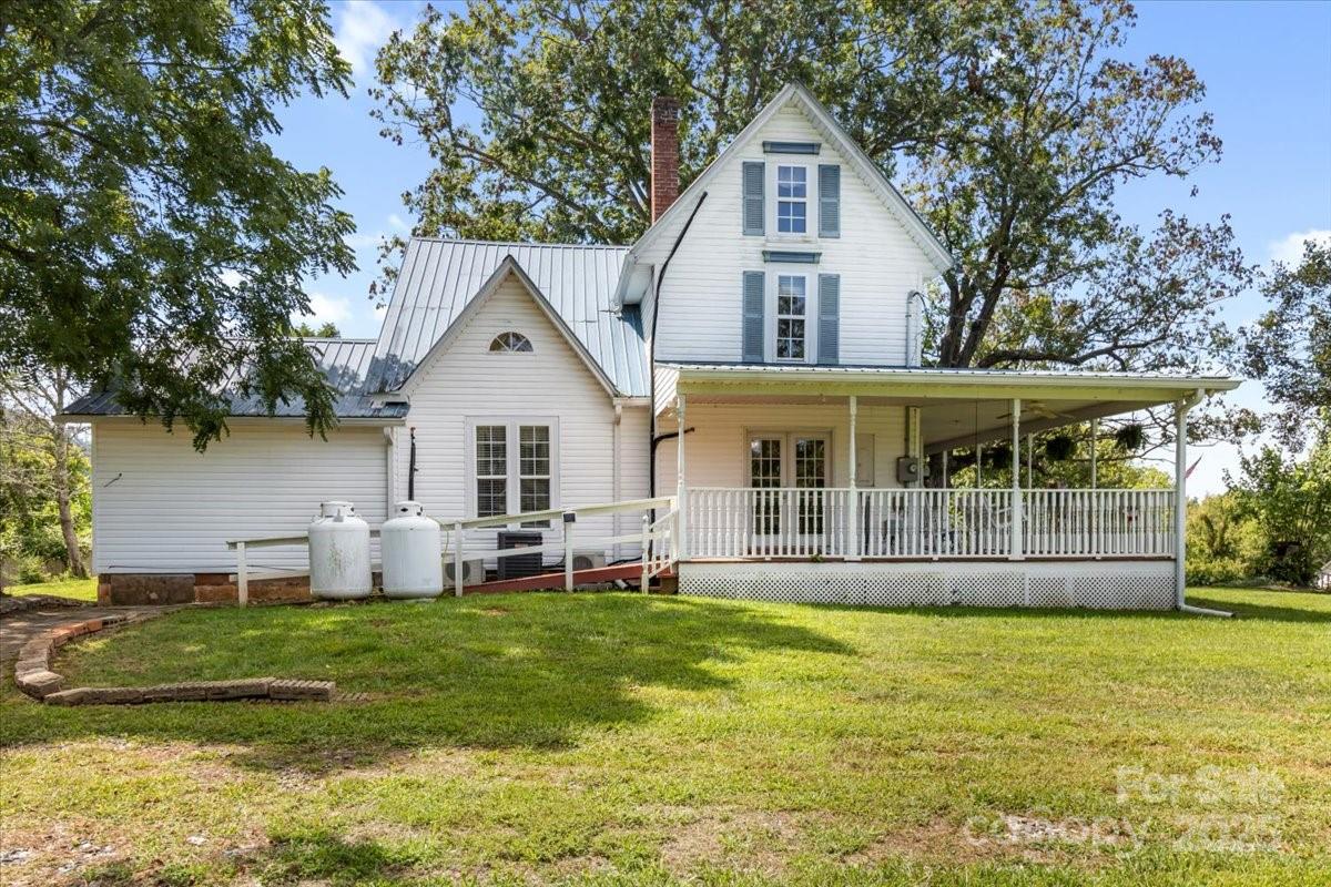 201 Murphy Hill Road Weaverville, NC 28787 - Photo 46 of 48 a front view of a house with a yard and porch