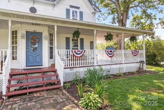 a view of a door with a bench