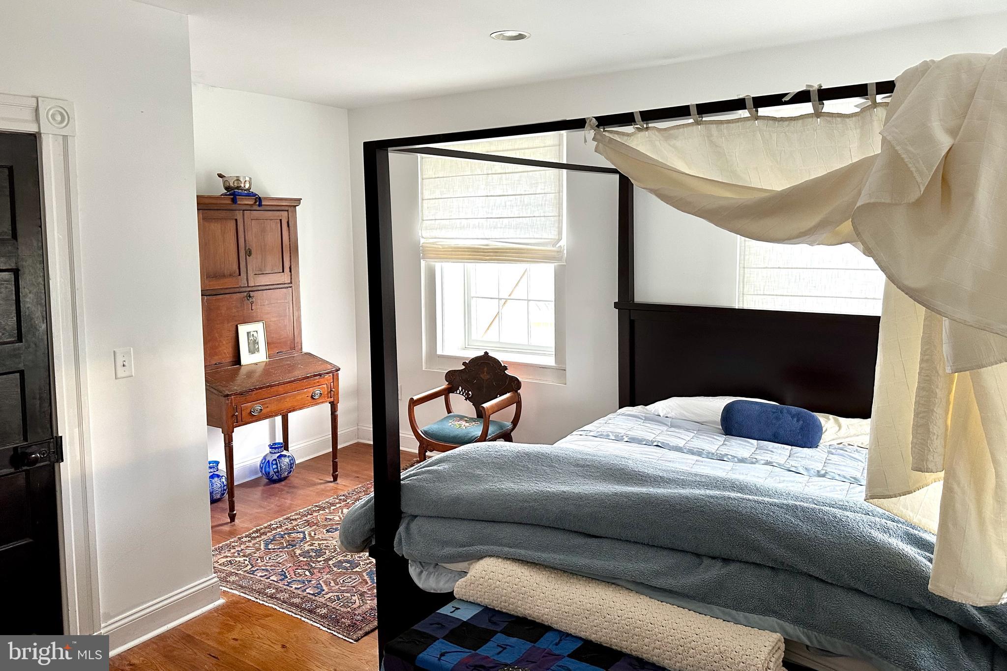 25789 Lambs Meadow Road Worton, MD 21678 - Photo 13 of 24 a bedroom with a bed and a window