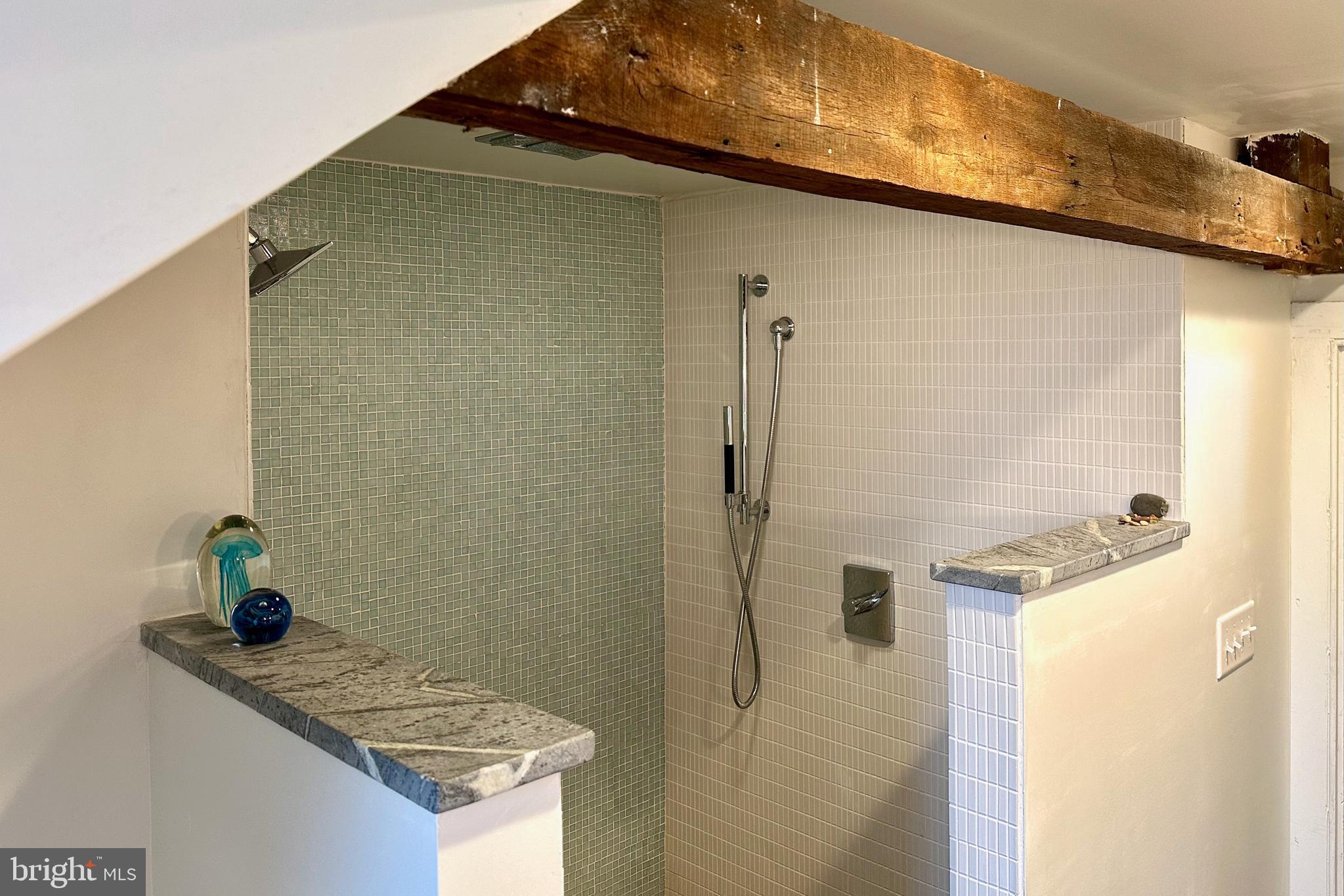 25789 Lambs Meadow Road Worton, MD 21678 - Photo 18 of 24 a bathroom with a granite countertop sink and white cabinets