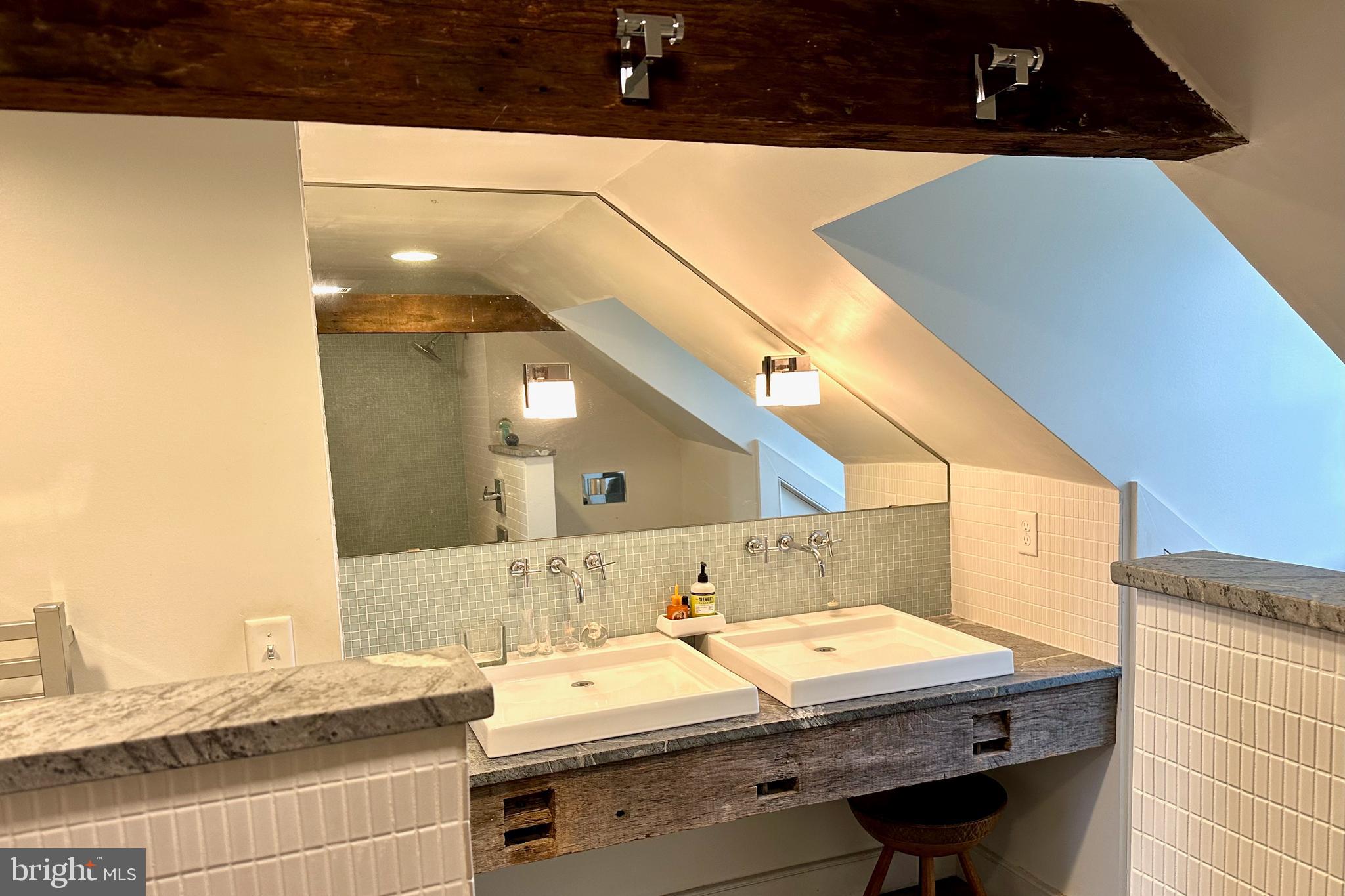 25789 Lambs Meadow Road Worton, MD 21678 - Photo 19 of 24 a bathroom with a sink and a mirror