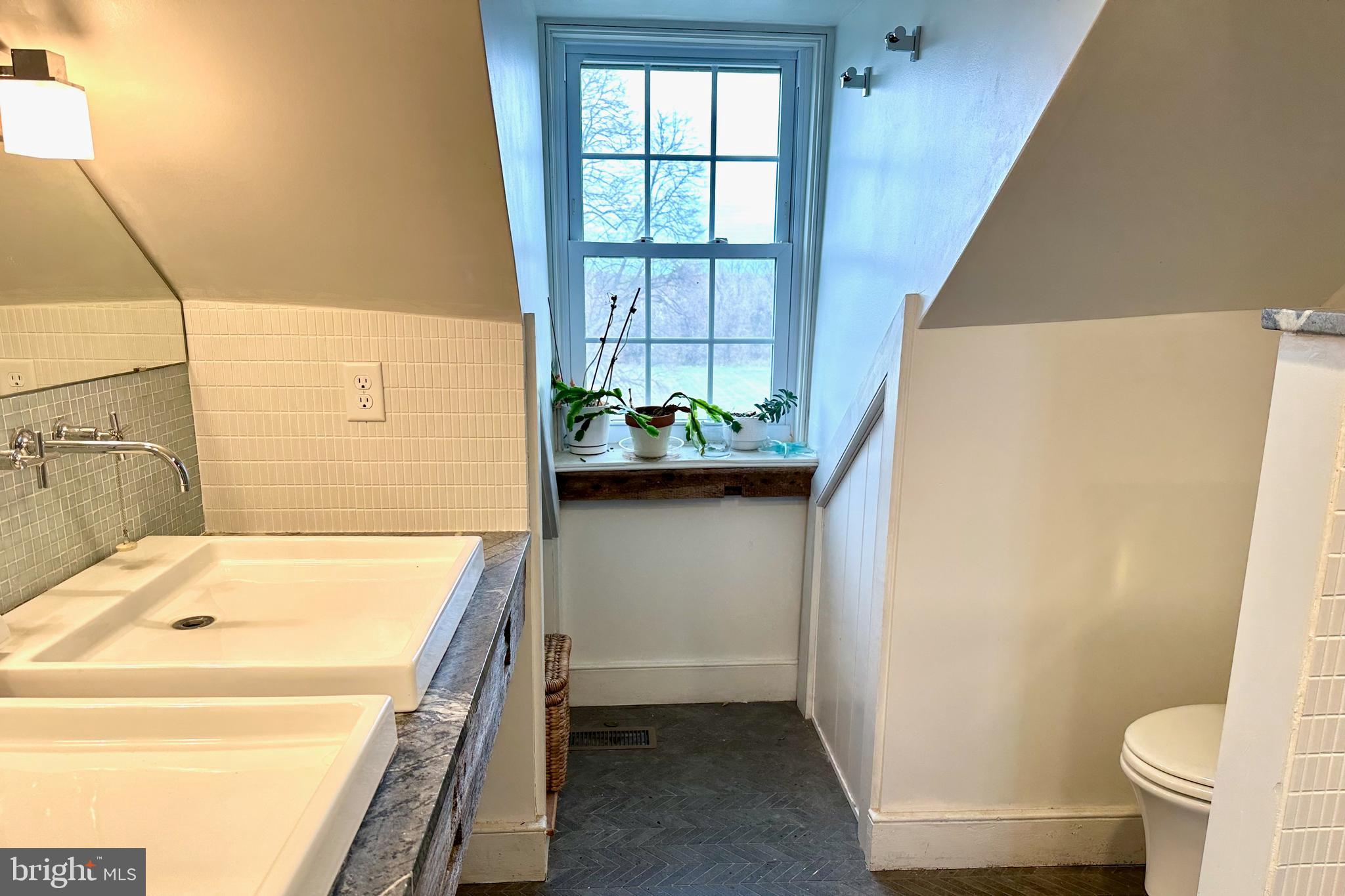 25789 Lambs Meadow Road Worton, MD 21678 - Photo 20 of 24 a bathroom with a sink and a tub