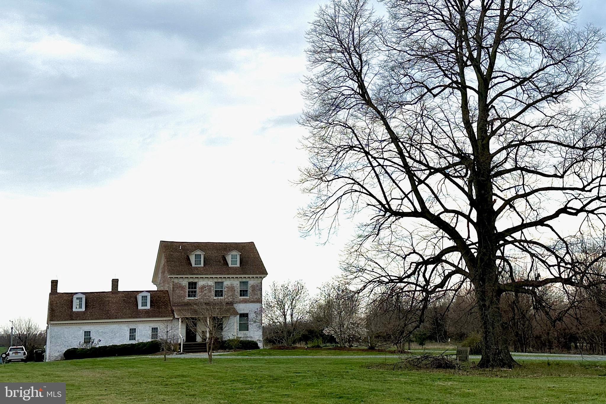 25789 Lambs Meadow Road Worton, MD 21678 - Photo 24 of 24 a view of a big building with big yard and large trees