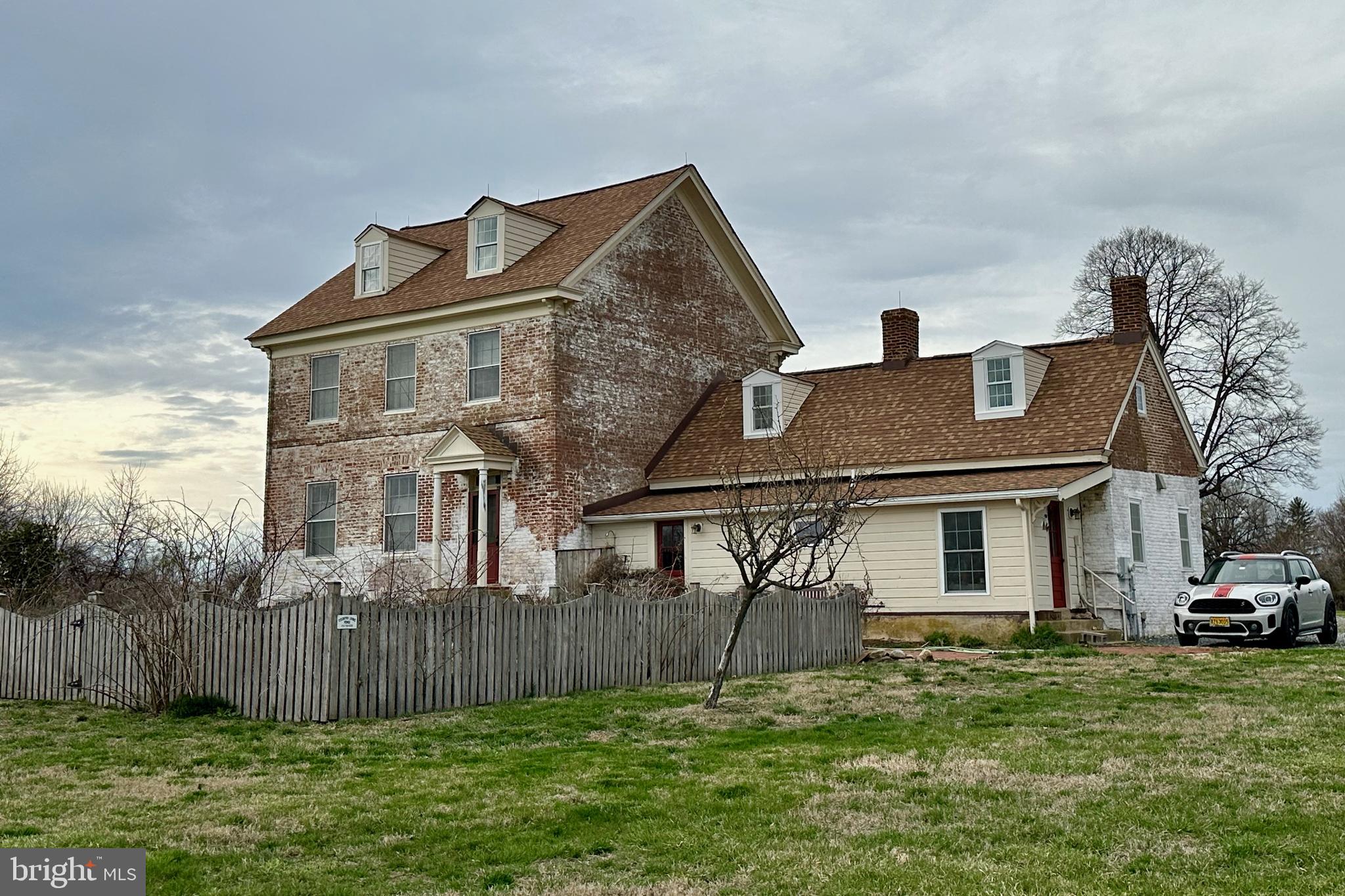 25789 Lambs Meadow Road Worton, MD 21678 - Photo 7 of 24 a front view of a house with a yard and more fence