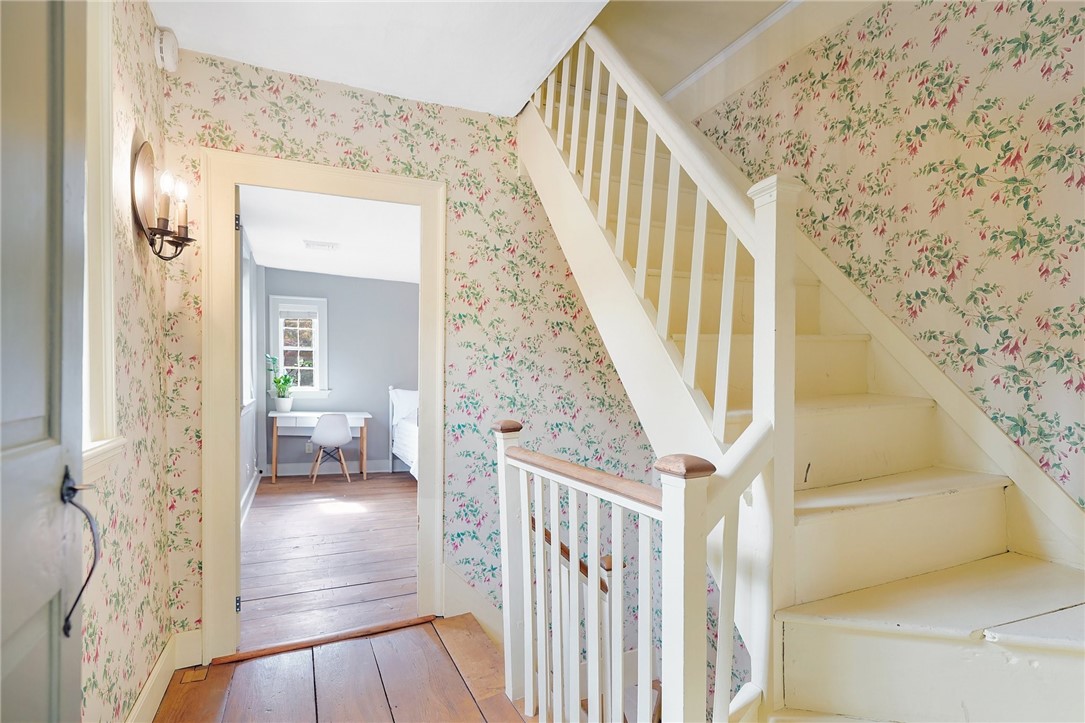 199 Plainfield Pike Foster, RI 02825 - Photo 29 of 50 Hallway to second bedroom. Stairs to attic.