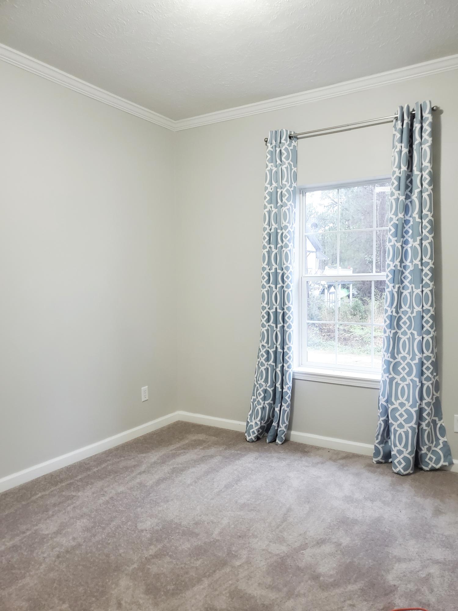 456 East Nursery Road Santa Rosa Beach, FL 32459 - Photo 14 of 21 a view of an empty room with a window