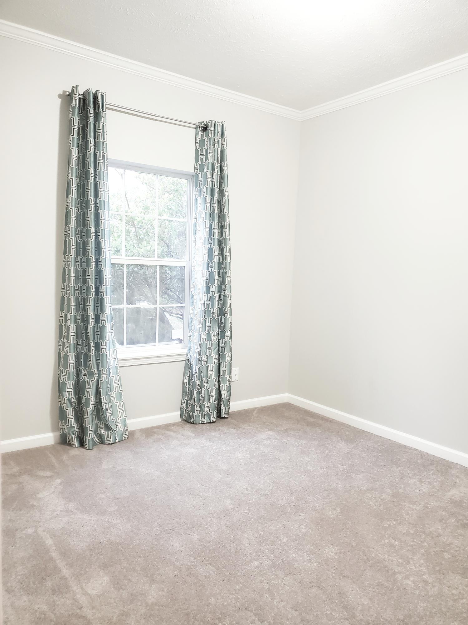 456 East Nursery Road Santa Rosa Beach, FL 32459 - Photo 16 of 21 a view of an empty room with a window