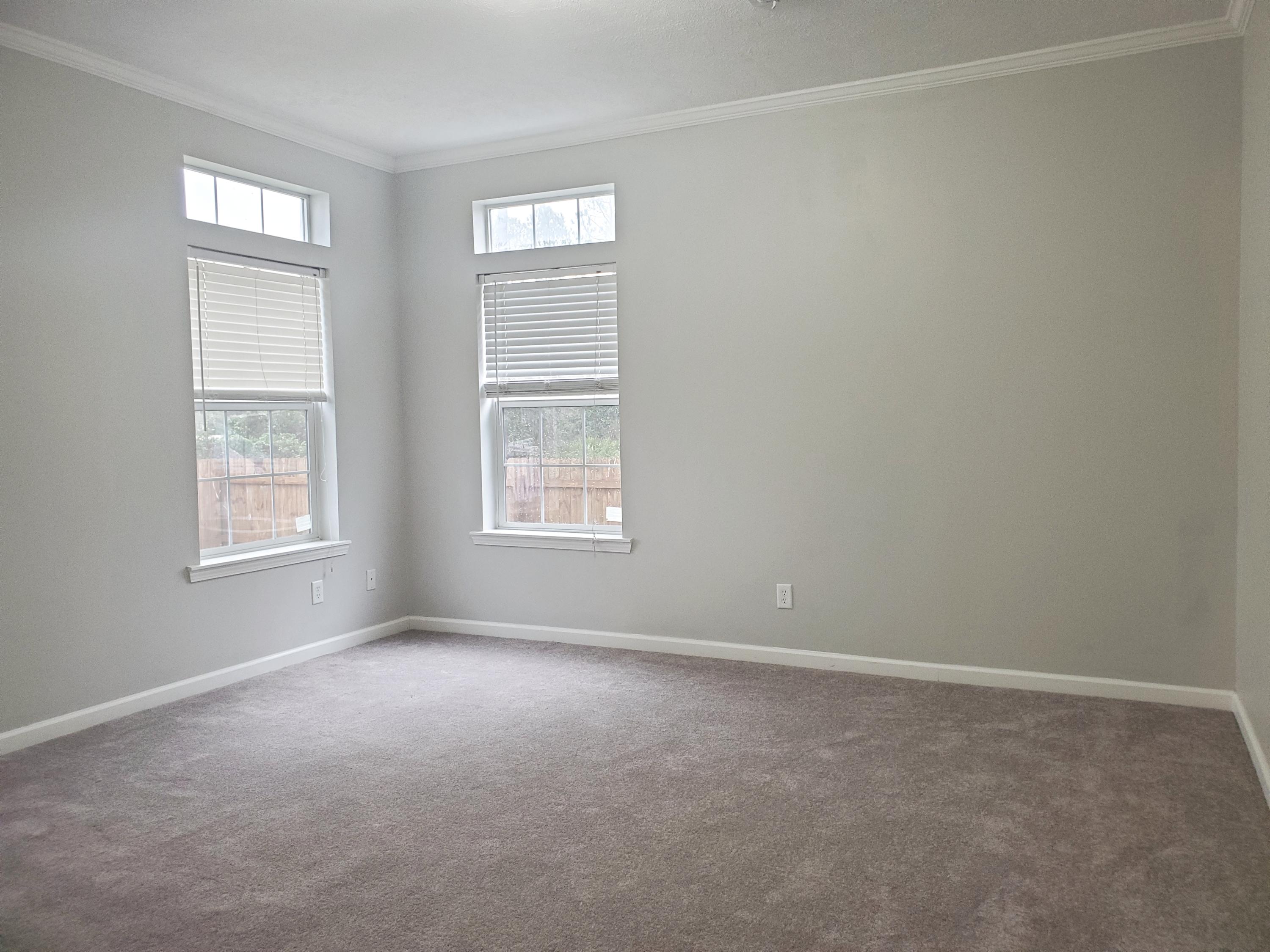 456 East Nursery Road Santa Rosa Beach, FL 32459 - Photo 8 of 21 an empty room with windows