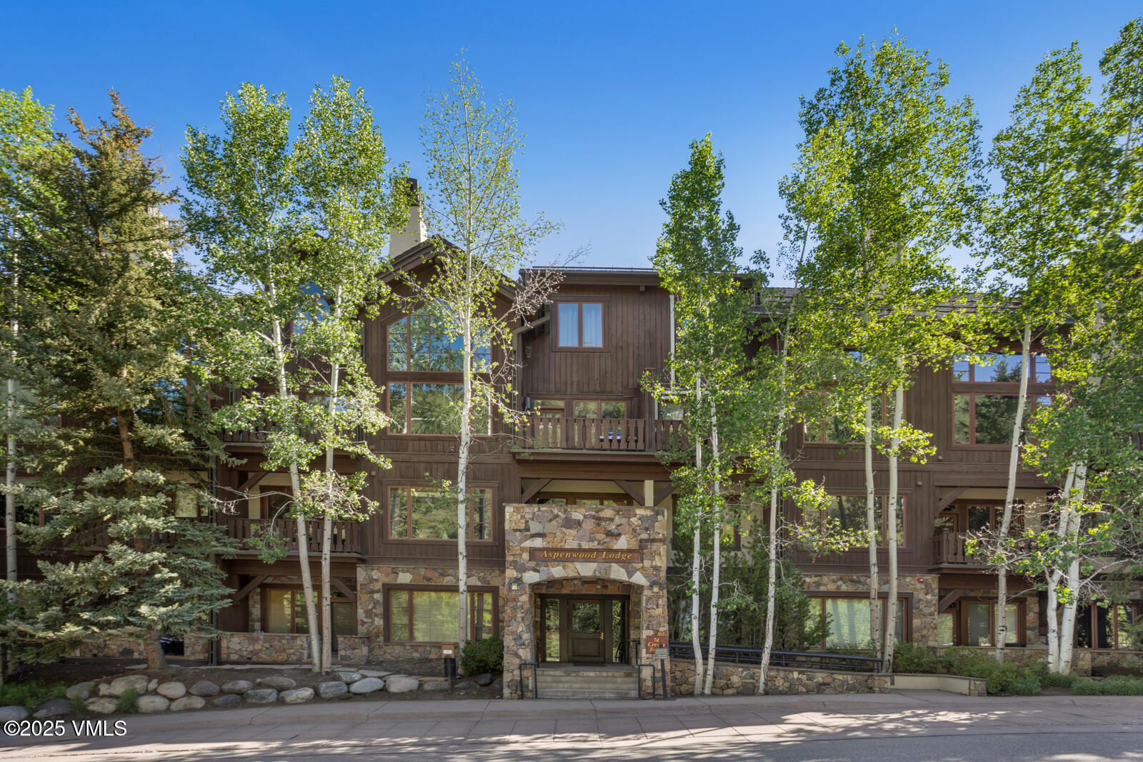 74 Cresta Road, Unit 106 Edwards, CO 81632 - Photo 20 of 22 front view of a building with a street