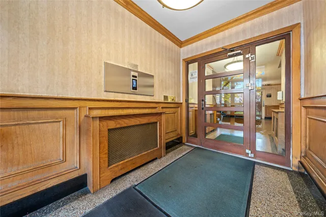 a kitchen with stainless steel appliances granite countertop a stove and a refrigerator