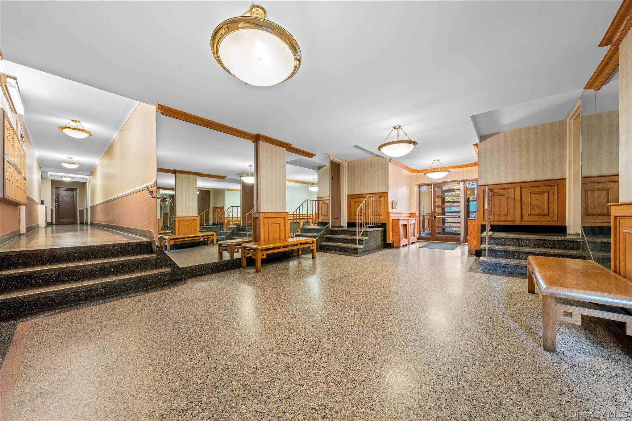 140-18 Burden Crescent, Unit 305 Queens, NY 11435 - Photo 4 of 15 a view of a room with gym equipment