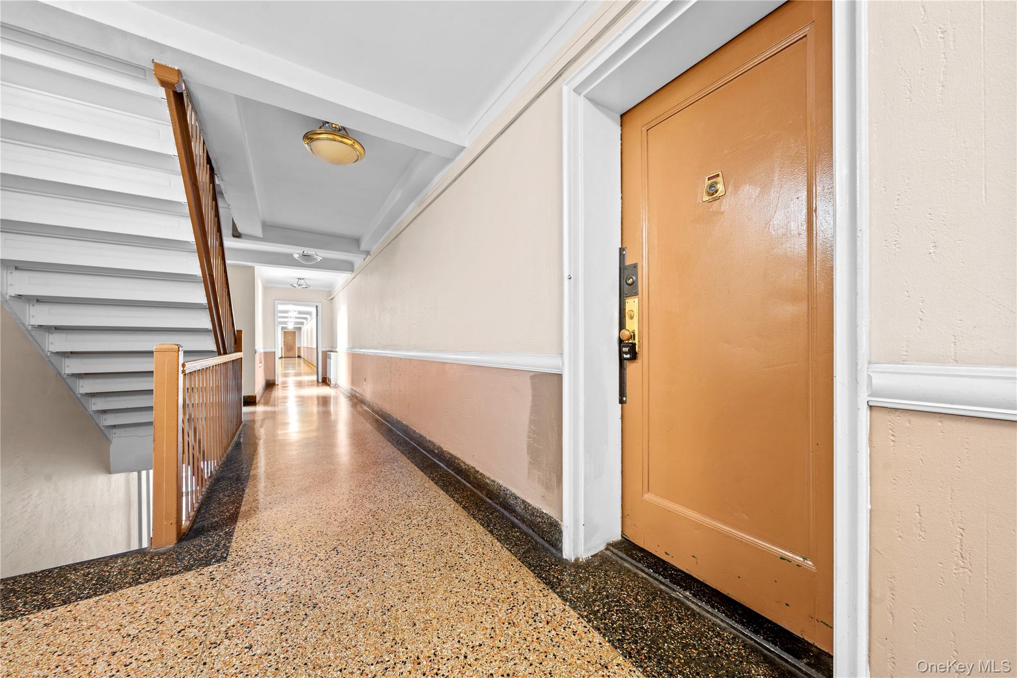 140-18 Burden Crescent, Unit 305 Queens, NY 11435 - Photo 6 of 15 a view of a hallway view with staircase