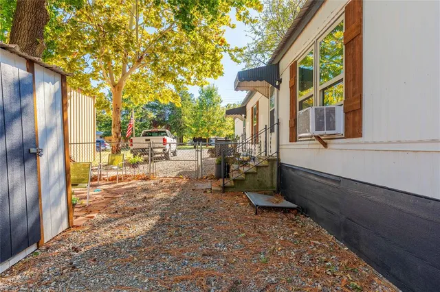 a view of a swimming pool with a patio
