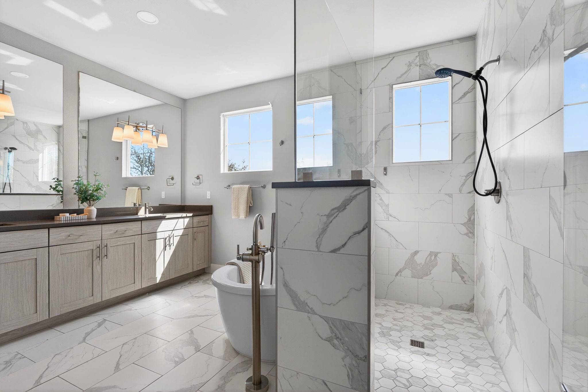 7803 Ryans Way Austin, TX 78726 - Photo 22 of 38 The separate walk-in shower offers modern convenience.