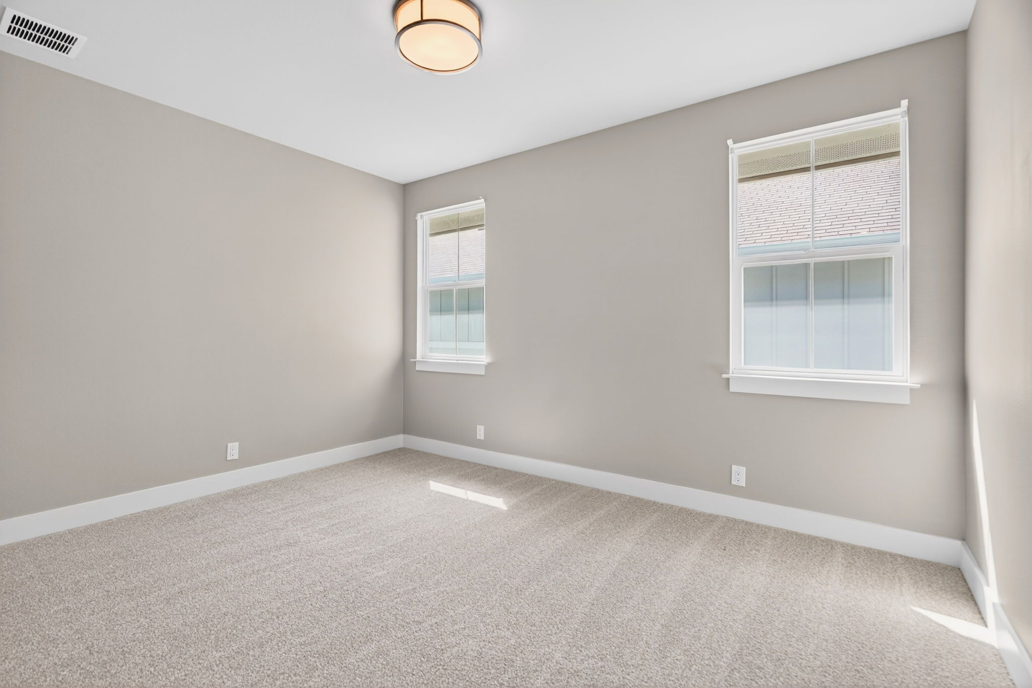 7803 Ryans Way Austin, TX 78726 - Photo 25 of 38 Two spacious upstairs guest bedrooms provide comfort and privacy.