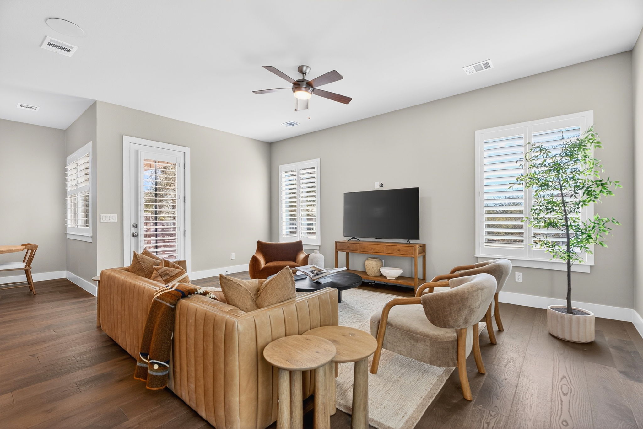 7803 Ryans Way Austin, TX 78726 - Photo 10 of 38 Large windows with plantation shutters provide natural light with privacy control.
