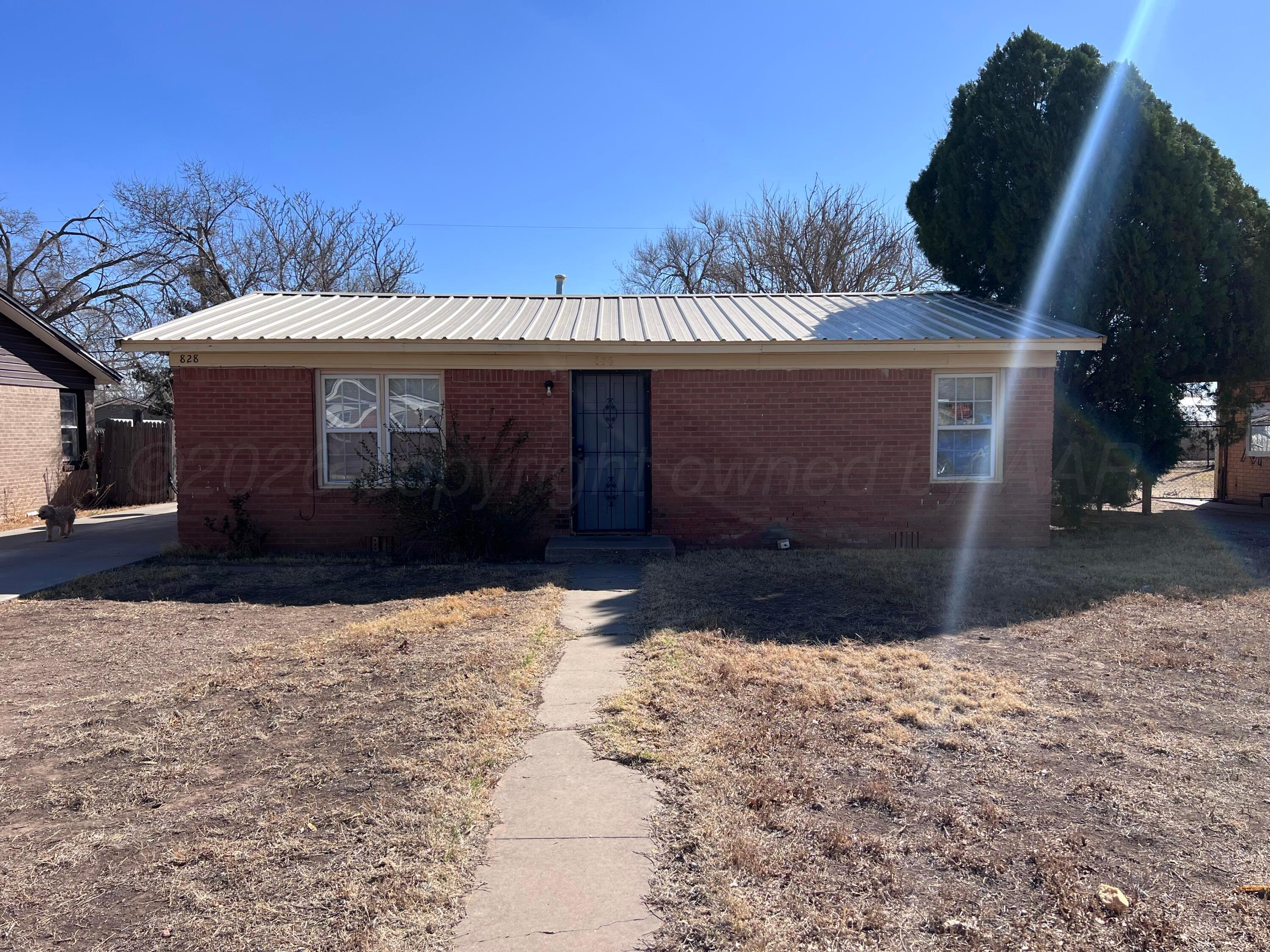 828 Blevins Street Hereford, TX 79045 - Photo 2 of 14 a front view of a house