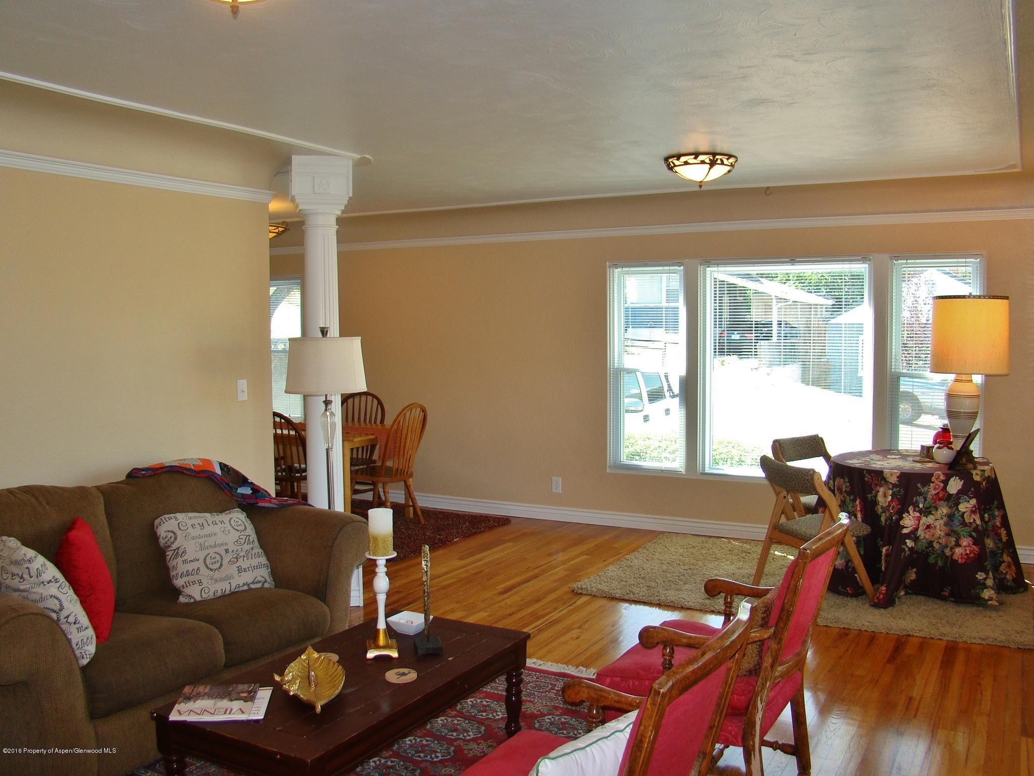 1010 Munro Avenue Rifle, CO 81650 - Photo 5 of 23 a living room with furniture and a large window